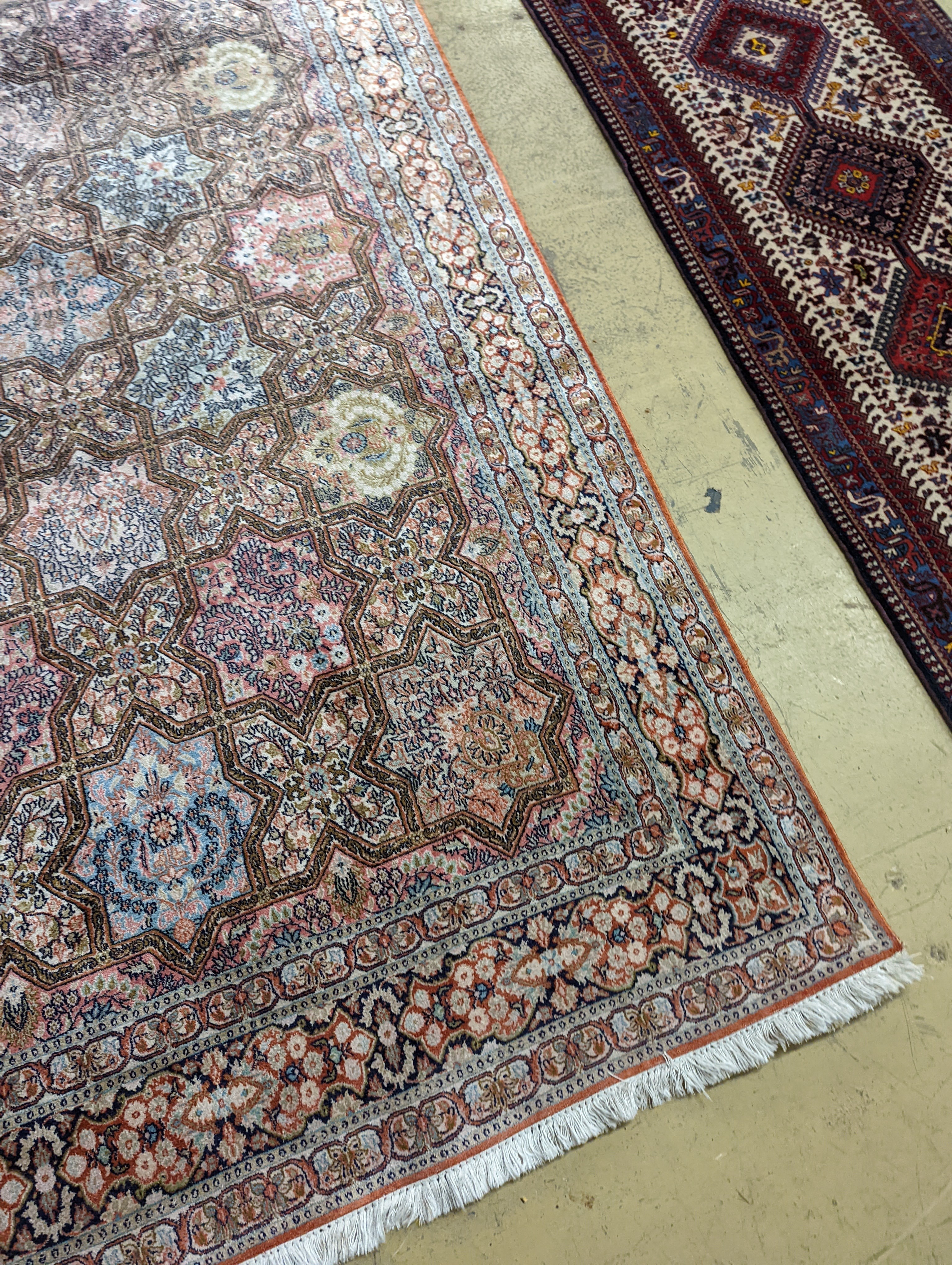 Two Turkish rugs and a Persian rugs. Largest, 284x172cm.